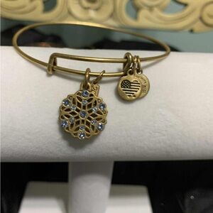 Alex & Ani Chic Gold Bangle with snowflake charm and blue stones